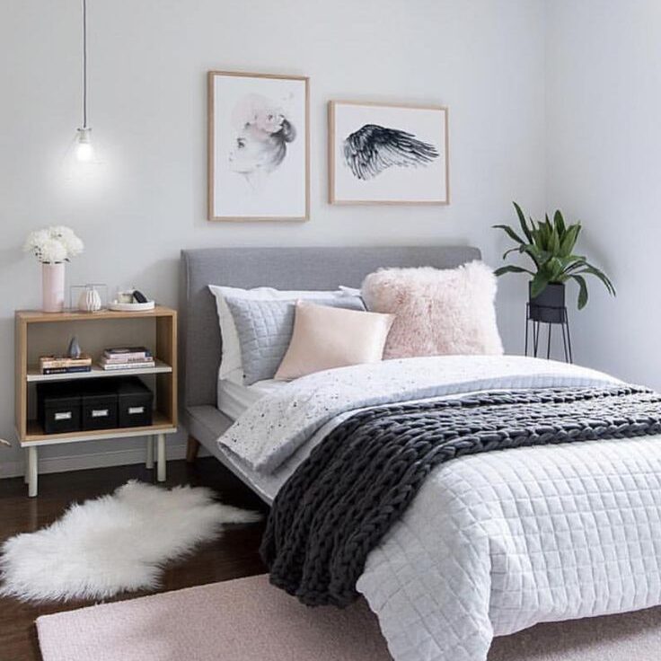 Scandinavian Bedroom with grey details and wall